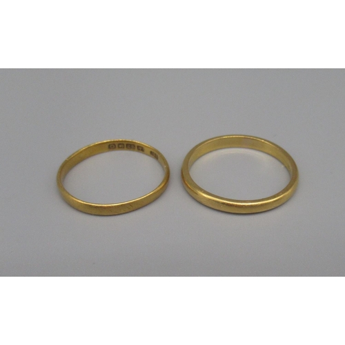 611 - Two 22ct yellow gold wedding bands, size P and M1/2, both stamped 22, 4.4g