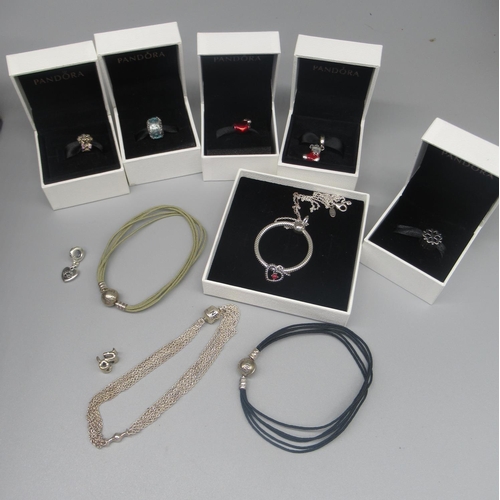 620 - Collection of Pandora jewellery including three bracelets, a necklace and seven charms, boxed