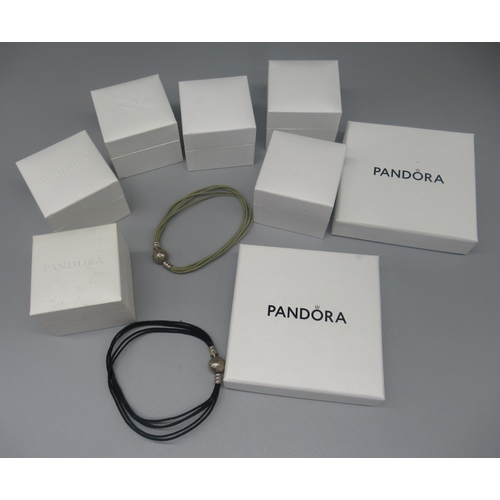 620 - Collection of Pandora jewellery including three bracelets, a necklace and seven charms, boxed