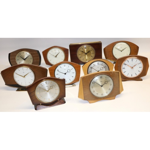 479 - 1950's Metamec 30 hour formica veneered mantle clock, silvered dial on turned brass feet W21cm and n... 