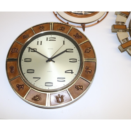 484 - 1970's Metamec wall clock, signed copper tone dial the hours interspersed with signs of The Zodiac, ... 