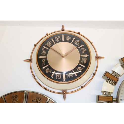 484 - 1970's Metamec wall clock, signed copper tone dial the hours interspersed with signs of The Zodiac, ... 