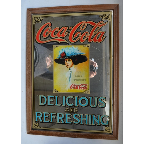 1253 - Three Coca-Cola advertising mirrors to include large 