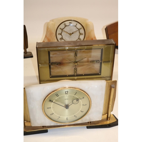 481 - 1950's Metamec simulated onyx and brass mantle clock, silvered dial, French hand wound movement W28.... 