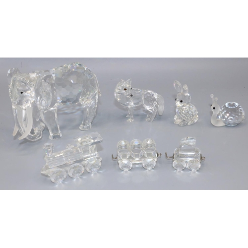 343 - Swarovski Crystal glass ornaments: elephant, H8.5cm; train with two carriages; snail, sitting rabbit... 