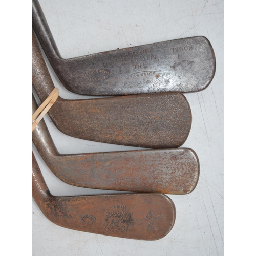 1299 - Collection of 11 vintage hickory handled golf clubs to incl. putters, a Jigger, Niblicks etc, golf b... 