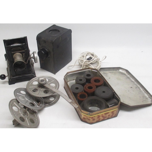 1319 - Cine Film reel player with tin of Cine film reel (a/f)