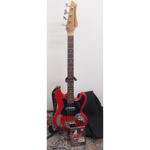 413 - Unnamed red bass guitar, bolt on neck, with USA flag decorated strap, in black carry bag and a 'Play... 