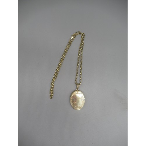 769 - 9ct yellow gold shaped oval locket with floral border, on 9ct yellow gold belcher chain, L51cm, both... 