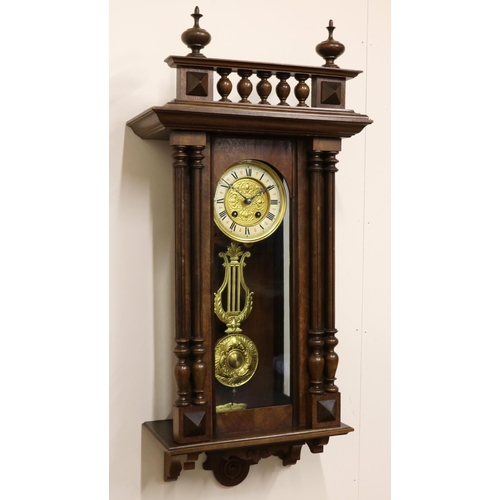 250 - C20th continental walnut Vienna quarter striking wall clock, moulded case with spindle gallery and t... 