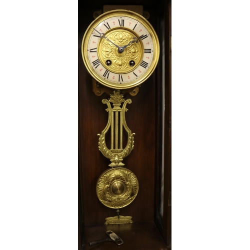 250 - C20th continental walnut Vienna quarter striking wall clock, moulded case with spindle gallery and t... 