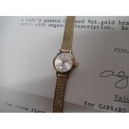 626 - Ladies Garrard quartz wristwatch, 9ct yellow gold bracelet, stamped 375, with engraved inscription t... 