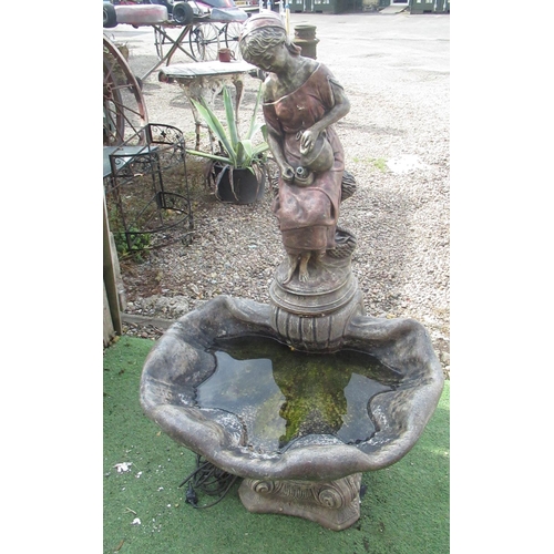 748 - Composition garden water feature, cast as a female water carrier seated by a shell, H120cm W65cm