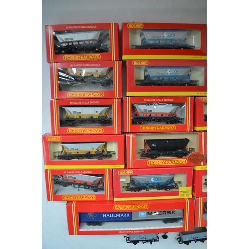 504 - Twenty three boxed OO gauge Hornby goods wagons to include Hopper and Container Wagons, 3 unboxed wa... 