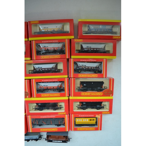 504 - Twenty three boxed OO gauge Hornby goods wagons to include Hopper and Container Wagons, 3 unboxed wa... 