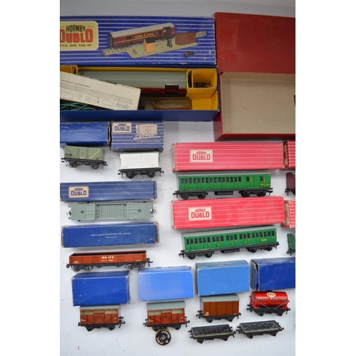 509 - Collection of vintage Hornby Dublo goods wagons and passenger coaches, mostly boxed. Please refer to... 