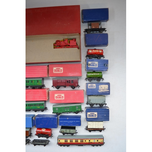 509 - Collection of vintage Hornby Dublo goods wagons and passenger coaches, mostly boxed. Please refer to... 