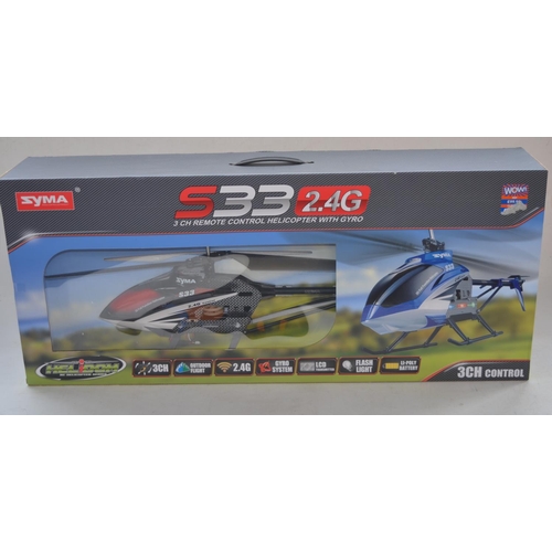 Large outdoor Syma S33 3 channel remote controlled helicopter model with charger and hand held trans