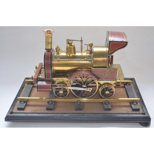 492 - Attractive all metal model of an early steam locomotive, possibly live steam, likely scratch built o... 