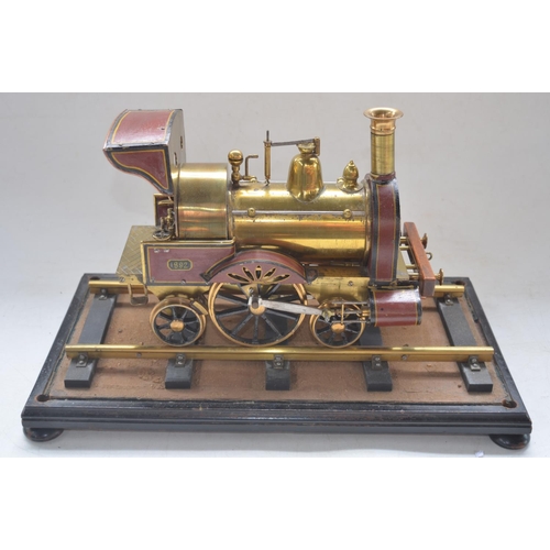 492 - Attractive all metal model of an early steam locomotive, possibly live steam, likely scratch built o... 