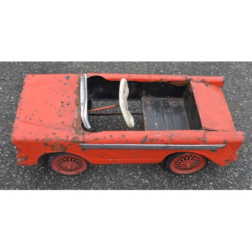 321 - Vintage Triang child's pressed steel pedal car (in need of restoration). Pedal function works, steer... 