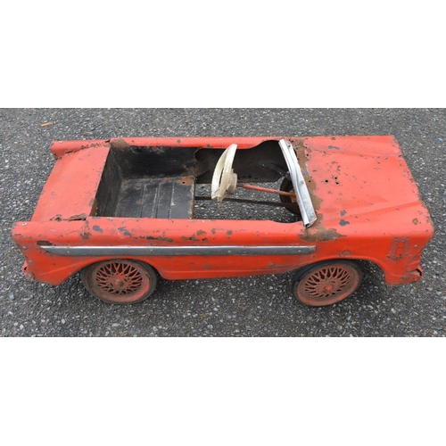 321 - Vintage Triang child's pressed steel pedal car (in need of restoration). Pedal function works, steer... 