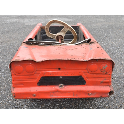 321 - Vintage Triang child's pressed steel pedal car (in need of restoration). Pedal function works, steer... 