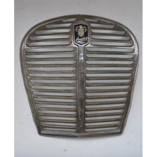 326 - Two vintage car radiator grilles, Austin A35 and  a vintage black painted number plate holder/fairin... 