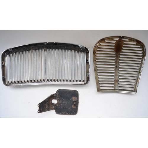 326 - Two vintage car radiator grilles, Austin A35 and  a vintage black painted number plate holder/fairin... 