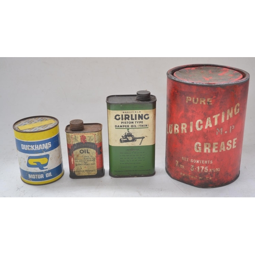 338 - Three vintage oil cans incl. Shell and Castrol (1 unmarked), and other oil cans (some filled) and 3 ... 