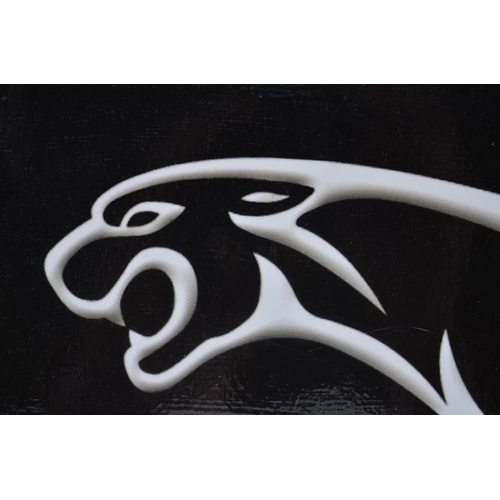 385 - Wood backed printed vinyl Jaguar sign 63cm x 35.5cm