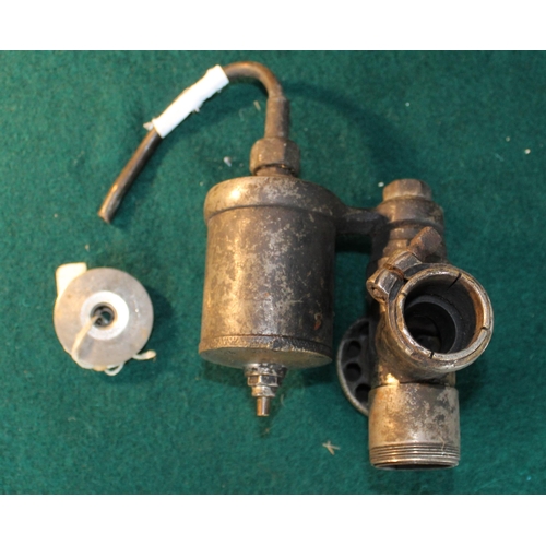 84 - Early motorcycle carburettor (AMAC Ltd) and a carburettor screw top (AMAC Ltd)