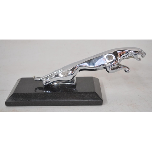 403 - Metal Jaguar hood ornament set on stone base as a paperweight W22cm D7.7cm H8.2cm and a metal Jaguar... 