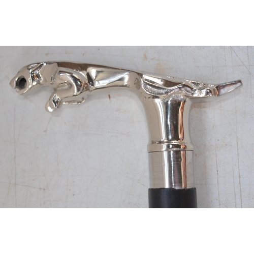 403 - Metal Jaguar hood ornament set on stone base as a paperweight W22cm D7.7cm H8.2cm and a metal Jaguar... 