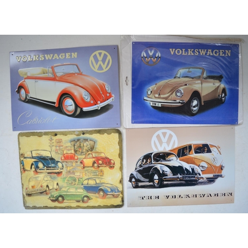 404 - Collection of Volkswagen Beetle ephemera incl. 4 photographic calendars, 3 modern steel plate signs ... 