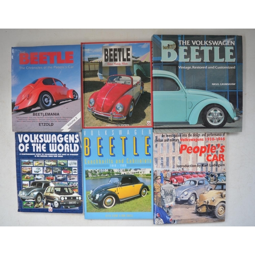 404 - Collection of Volkswagen Beetle ephemera incl. 4 photographic calendars, 3 modern steel plate signs ... 