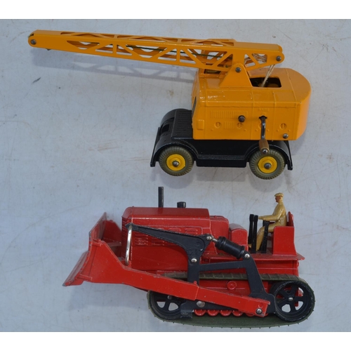 409 - Five boxed vintage Dinky Toys diecast model vehicles to include 561 Blaw Knox Bulldozer, 571 Coles M... 