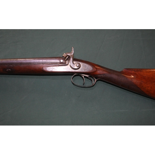 257 - W Eagan muzzle loading side by side percussion shotgun with ornate engraving to lock and woodwork, 2... 