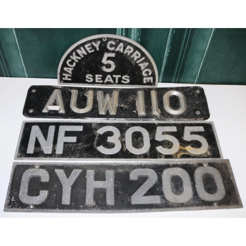 481 - R.W Coan cast metal ' 5 Seats Hackney Carriage' plaque and three vintage car number plates, (5)