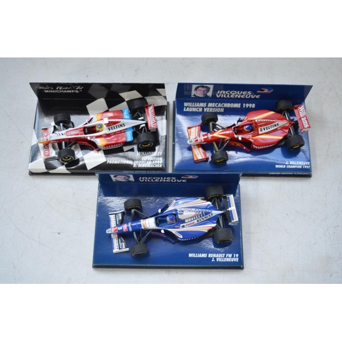 423 - Four Formula 1 diecast racing car models by Minichamps to include a 1/18 scale Williams F1 1st Editi... 