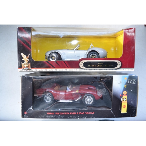 425 - 9x boxed 1/18 scale diecast model vehicles from various manufacturers to include Welly Nex Models VW... 