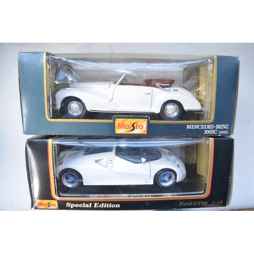 425 - 9x boxed 1/18 scale diecast model vehicles from various manufacturers to include Welly Nex Models VW... 