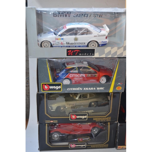 428 - 13x 1/18 scale diecast model vehicles incl. Burago, Maisto, Hot wheels etc.   All boxed.