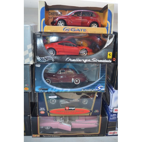 428 - 13x 1/18 scale diecast model vehicles incl. Burago, Maisto, Hot wheels etc.   All boxed.