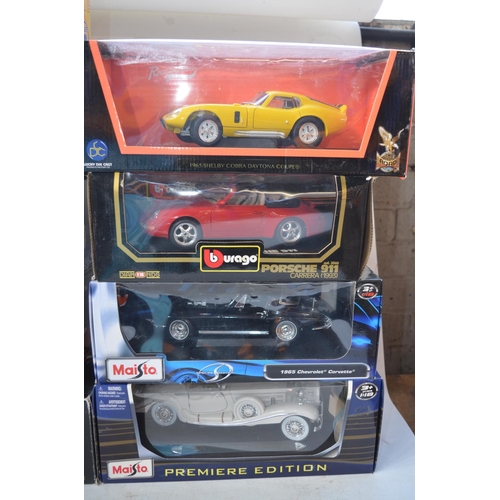 428 - 13x 1/18 scale diecast model vehicles incl. Burago, Maisto, Hot wheels etc.   All boxed.