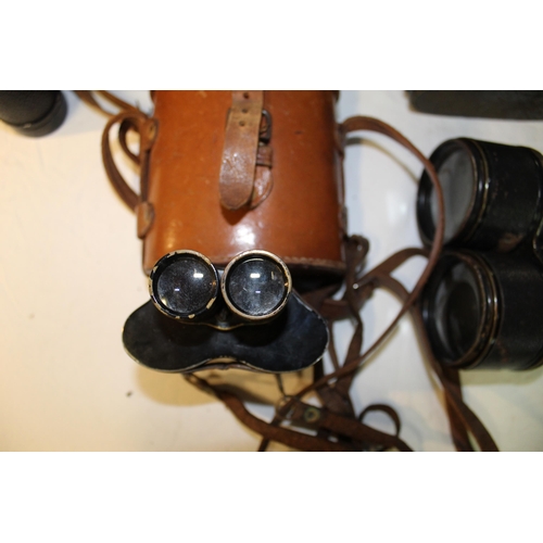 15 - Omega 8x30 binoculars in leather carry case, Aitchison of London Mono 8x binoculars in leather carry... 
