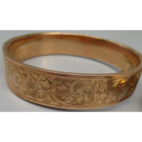 16 - 9ct yellow gold bangle with engraved leaf design, and another 9ct gold bangle, both stamped 9ct (A/F... 