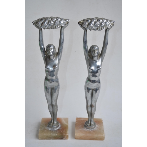 663 - Pair of c1930's chromed art deco figures of ladies holding flower garlands on alabaster bases. H35.5... 