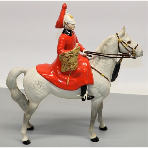 1250 - Beswick figure of a Life Guard on dappled grey horse, H25cm