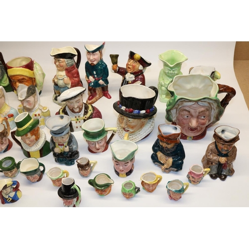 1257 - Large quantity of character and toby jugs by various manufacturers incl. Beswick, Roy Kirkham, Sylva... 